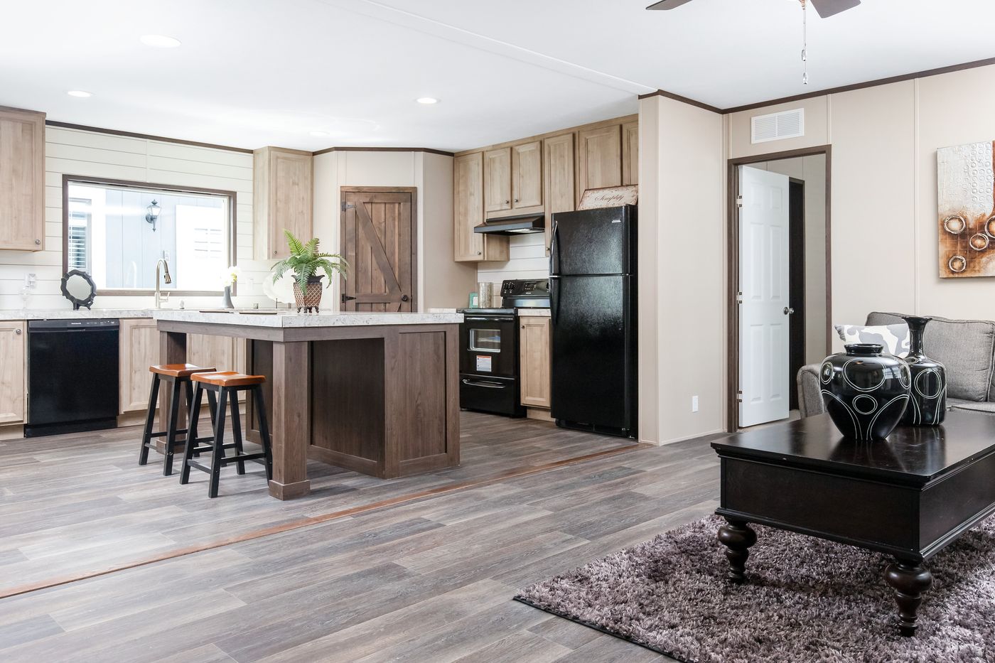 The PT 78 Kitchen. This Manufactured Mobile Home features 3 bedrooms and 2 baths.