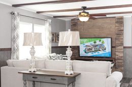 The TRADITION 76C Living Room. This Manufactured Mobile Home features 4 bedrooms and 2 baths.