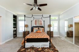 The GE662K Primary Bedroom. This Manufactured Mobile Home features 4 bedrooms and 2 baths.