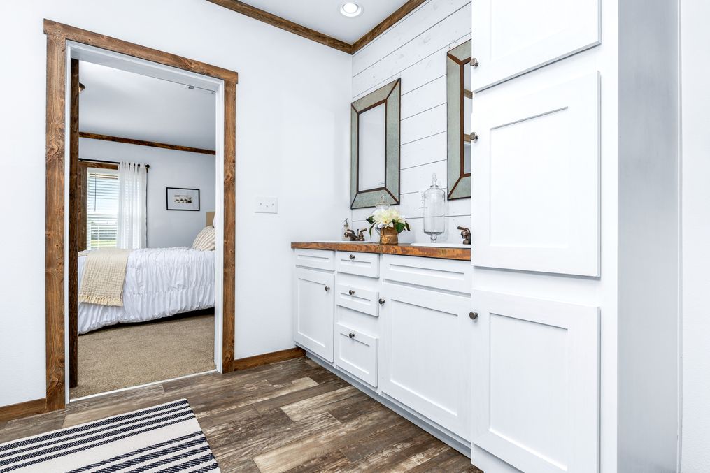 The THE DAISY-MAE Master Bathroom. This Manufactured Mobile Home features 3 bedrooms and 2 baths.