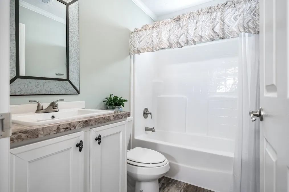 The THE JEFFERSON Guest Bathroom. This Manufactured Mobile Home features 3 bedrooms and 3 baths.