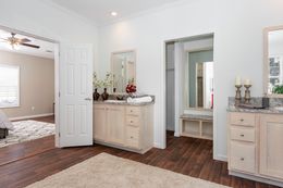 The NORMANDY Primary Bathroom. This Manufactured Mobile Home features 3 bedrooms and 2 baths.
