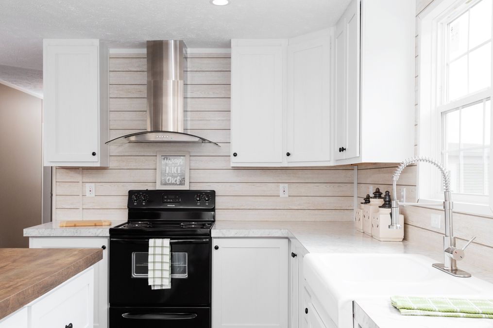 The ISLAND BREEZE Kitchen. This Manufactured Mobile Home features 3 bedrooms and 2 baths.