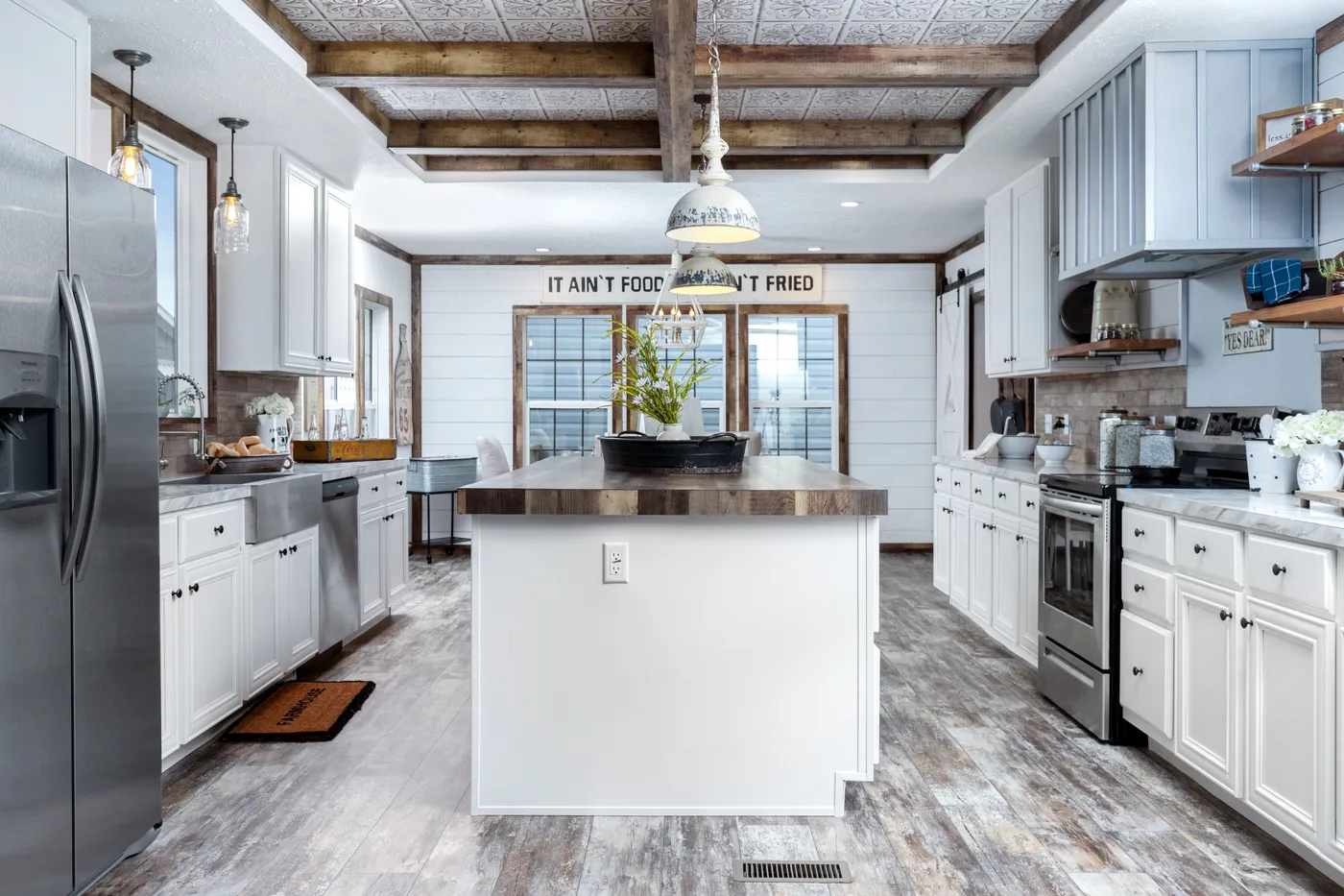 The THE LIZA JANE Kitchen. This Manufactured Mobile Home features 3 bedrooms and 2 baths.