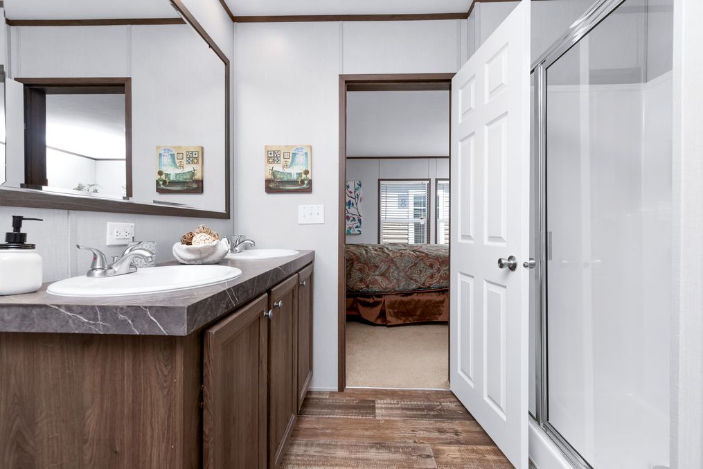 The CRAZY EIGHTS Master Bathroom. This Manufactured Mobile Home features 4 bedrooms and 2 baths.