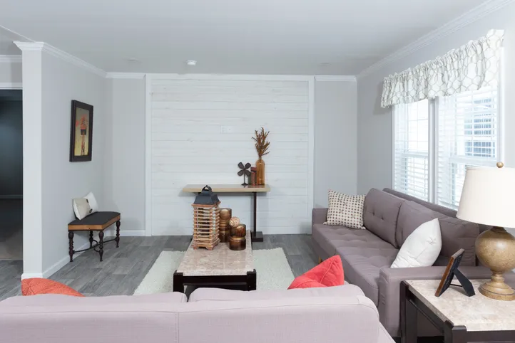 The THE FREEDOM BREEZE Living Room. This Manufactured Mobile Home features 3 bedrooms and 2 baths.