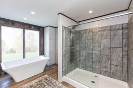 The THE HAMPTON BAY Primary Bathroom. This Manufactured Mobile Home features 3 bedrooms and 2 baths.