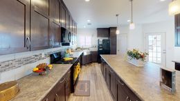 The SUM3068A Kitchen. This Manufactured Mobile Home features 3 bedrooms and 2 baths.