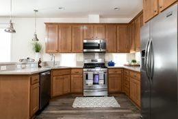 The MORRO BAY 20563-A Kitchen. This Manufactured Mobile Home features 3 bedrooms and 2 baths.