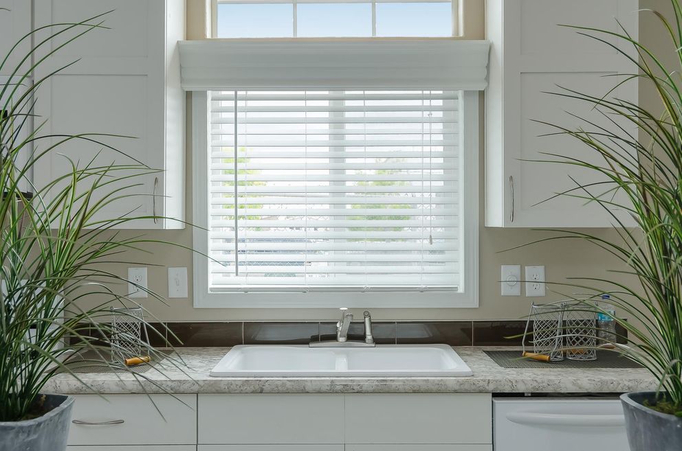 The TRANQUILITY TR3062A Kitchen. This Manufactured Mobile Home features 3 bedrooms and 2 baths.