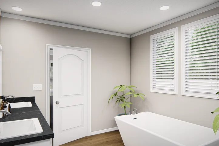 The THE VALHALLA Primary Bathroom. This Manufactured Mobile Home features 3 bedrooms and 2 baths.