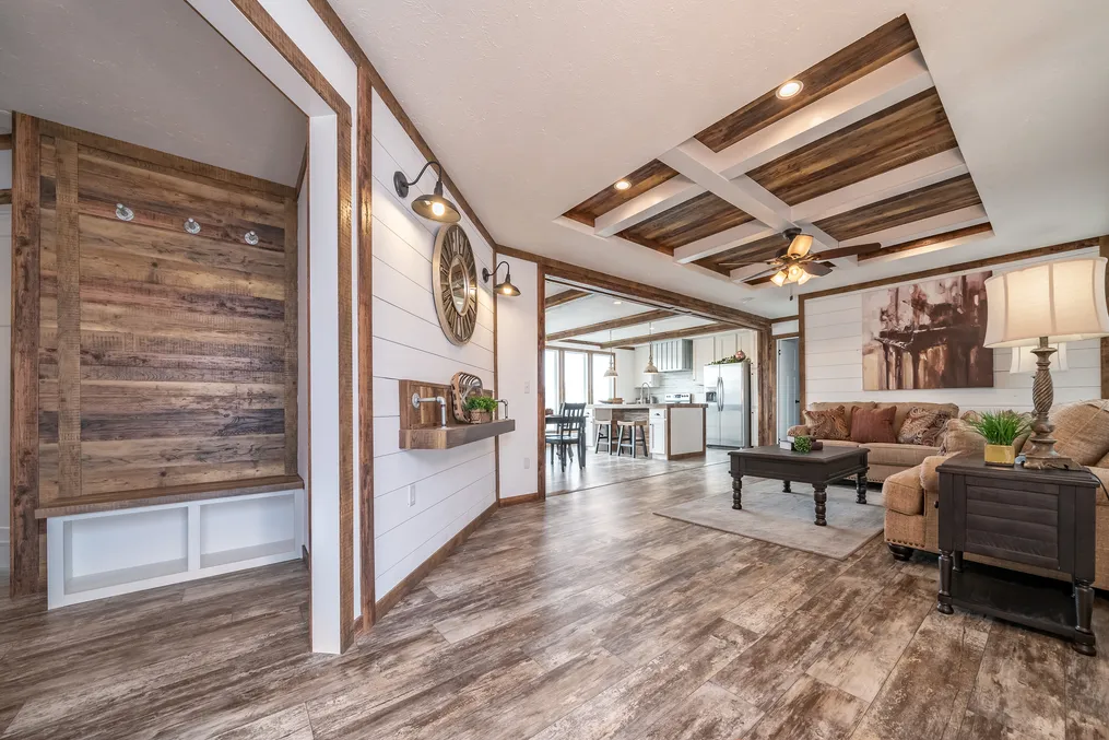 The THE AVALYN Living Room. This Manufactured Mobile Home features 3 bedrooms and 2 baths.