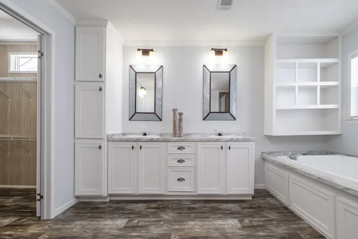 The THE LEAHY Primary Bathroom. This Manufactured Mobile Home features 4 bedrooms and 2 baths.