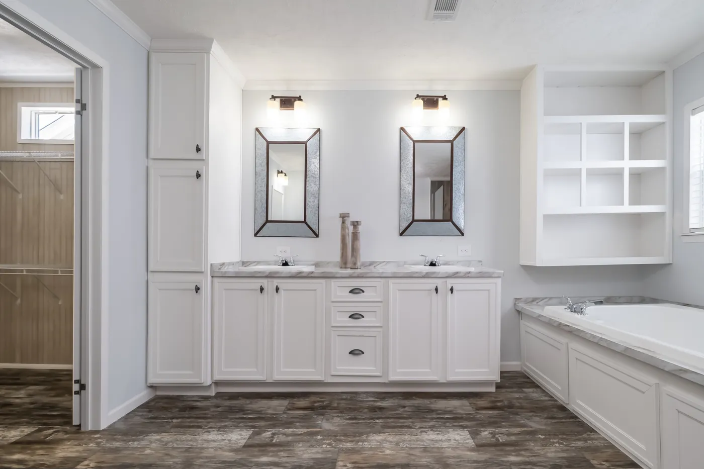 The THE LEAHY Primary Bathroom. This Manufactured Mobile Home features 4 bedrooms and 2 baths.