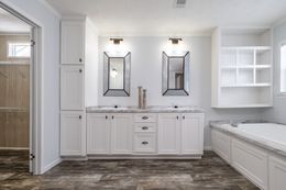 The THE LEAHY Master Bathroom. This Manufactured Mobile Home features 4 bedrooms and 2 baths.