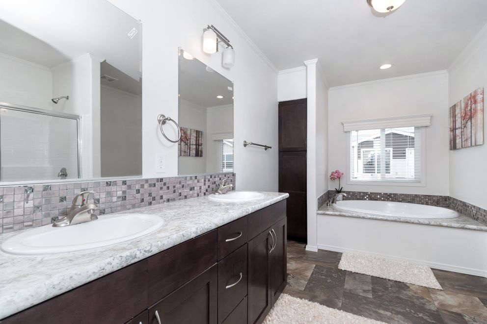 The K3060A Primary Bathroom. This Manufactured Mobile Home features 3 bedrooms and 2 baths.