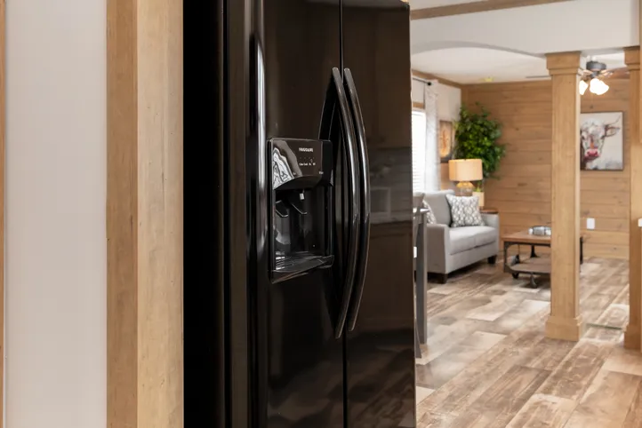 The THE BEXAR Kitchen. This Manufactured Mobile Home features 3 bedrooms and 2 baths.