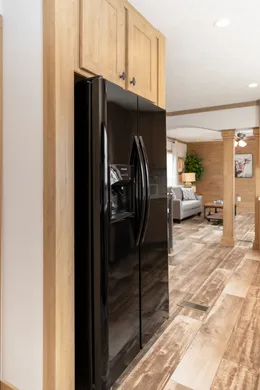 The THE BEXAR Kitchen. This Manufactured Mobile Home features 3 bedrooms and 2 baths.