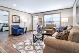 The AMELIA Living Room. This Manufactured Mobile Home features 4 bedrooms and 2 baths.