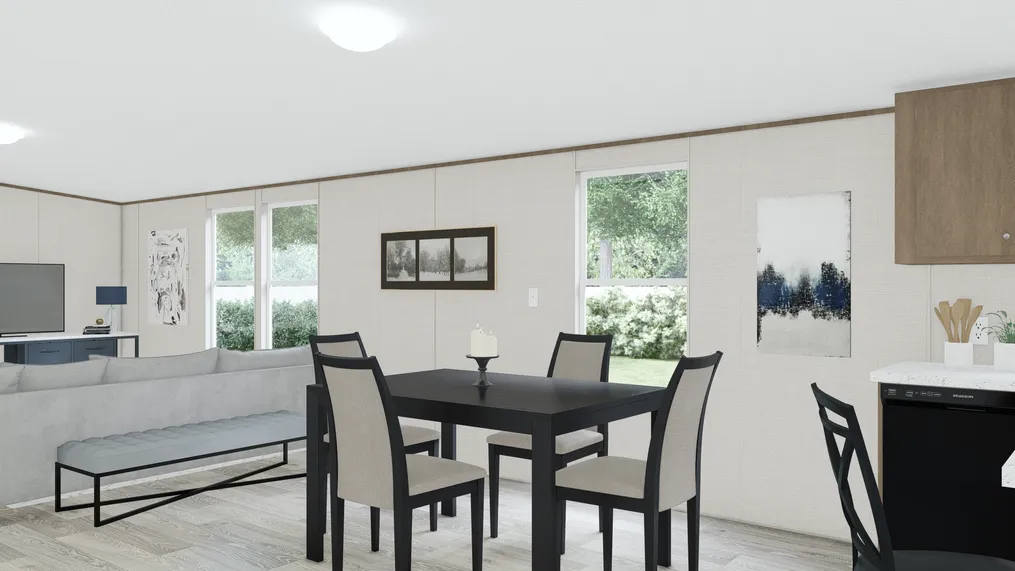 The PRIDE Dining Area. This Manufactured Mobile Home features 4 bedrooms and 2 baths.
