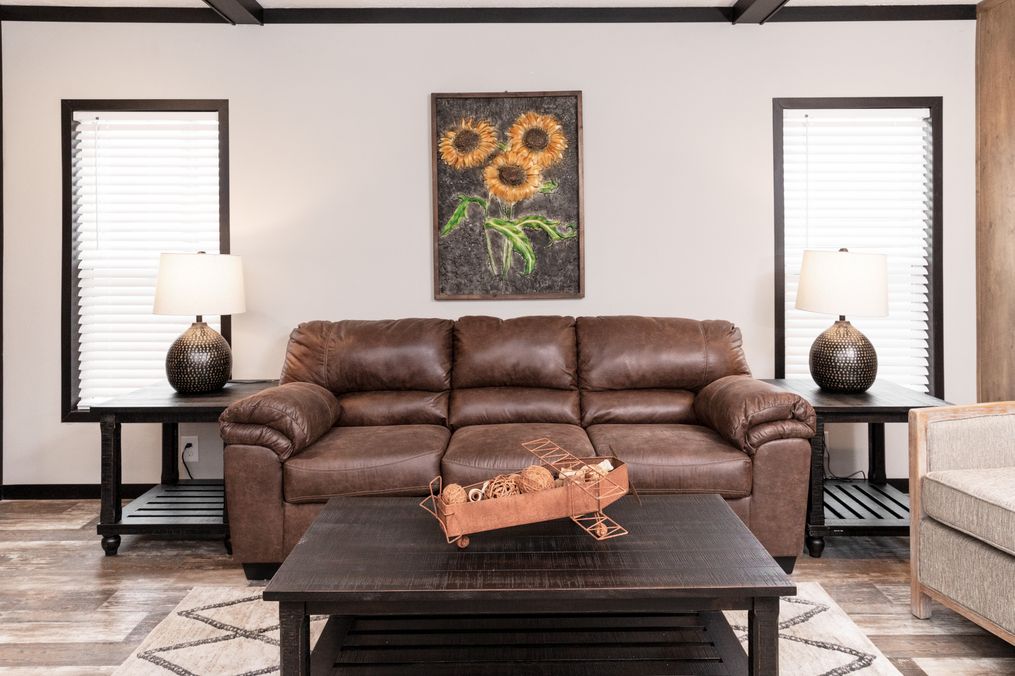 The BOUJEE Den. This Manufactured Mobile Home features 3 bedrooms and 2 baths.