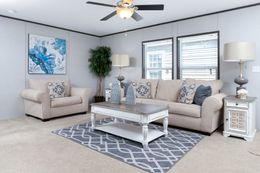 The CRAZY EIGHTS Living Room. This Manufactured Mobile Home features 4 bedrooms and 2 baths.