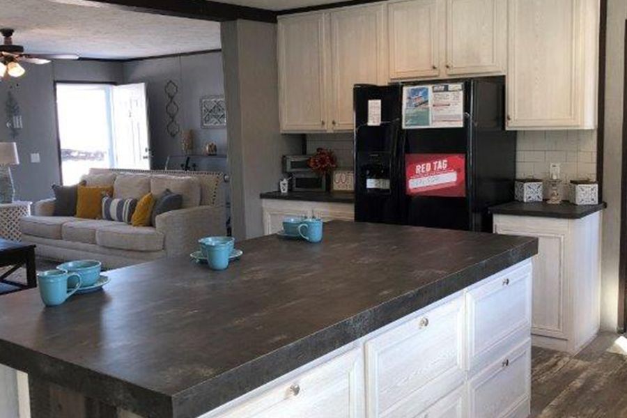 The THE MEADOWBROOK Kitchen. This Manufactured Mobile Home features 4 bedrooms and 2 baths.