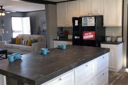 The THE MEADOWBROOK Kitchen. This Manufactured Mobile Home features 4 bedrooms and 2 baths.