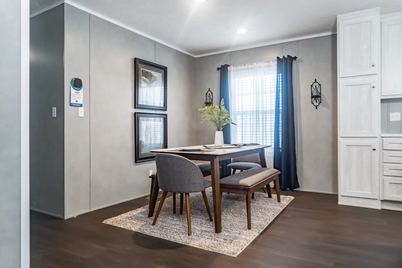 The ULTRA BREEZE 52 Dining Area. This Manufactured Mobile Home features 3 bedrooms and 2 baths.