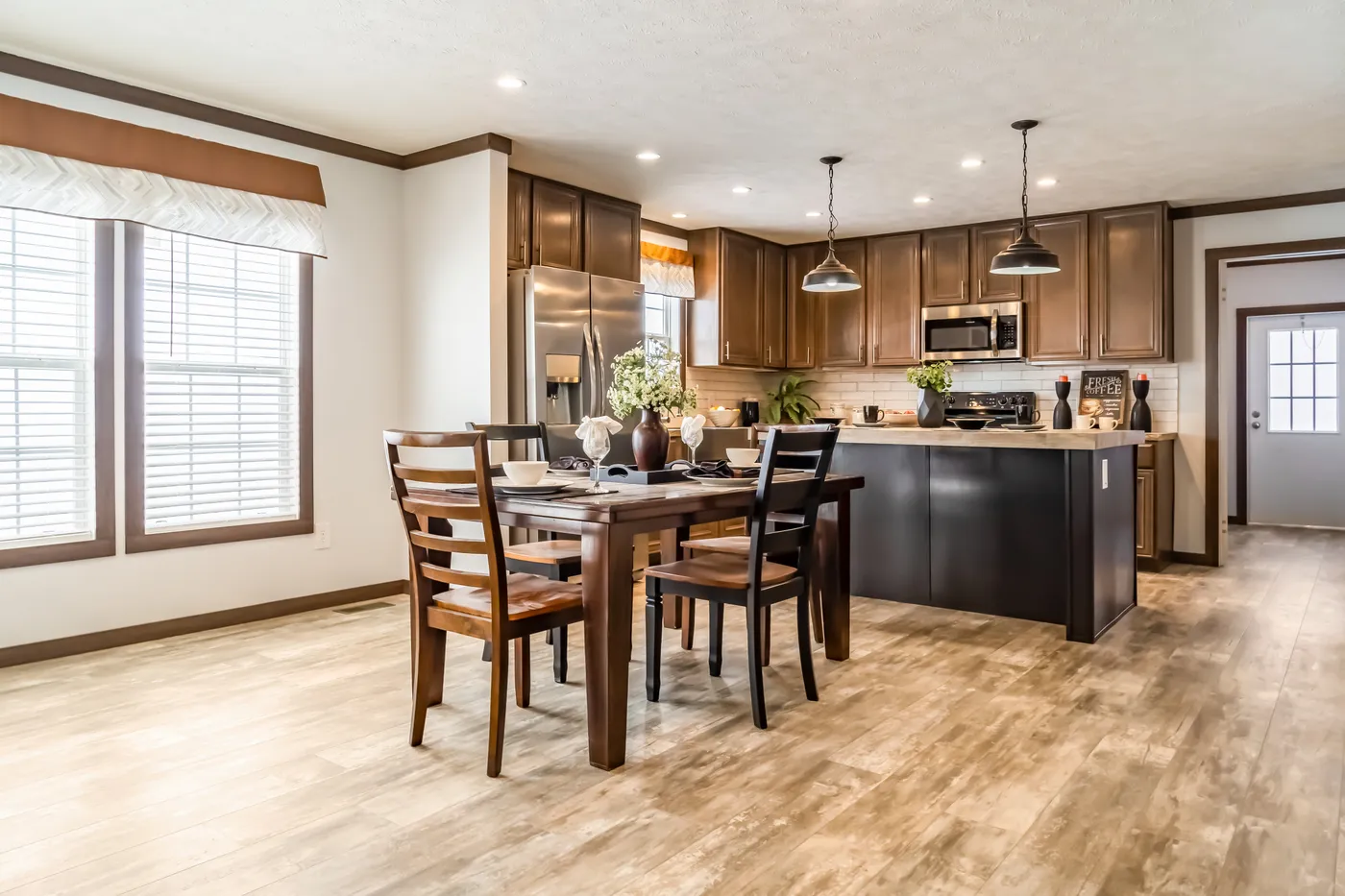 The THE TURNER Dining Room. This Manufactured Mobile Home features 3 bedrooms and 2 baths.