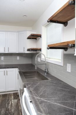 The EBONY Kitchen. This Manufactured Mobile Home features 4 bedrooms and 2 baths.