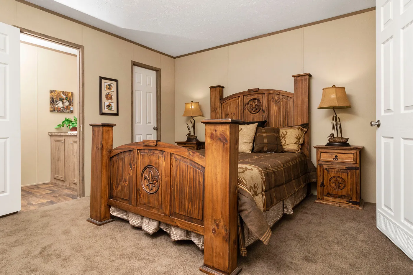The THE HANCOCK Primary Bedroom. This Manufactured Mobile Home features 2 bedrooms and 2 baths.