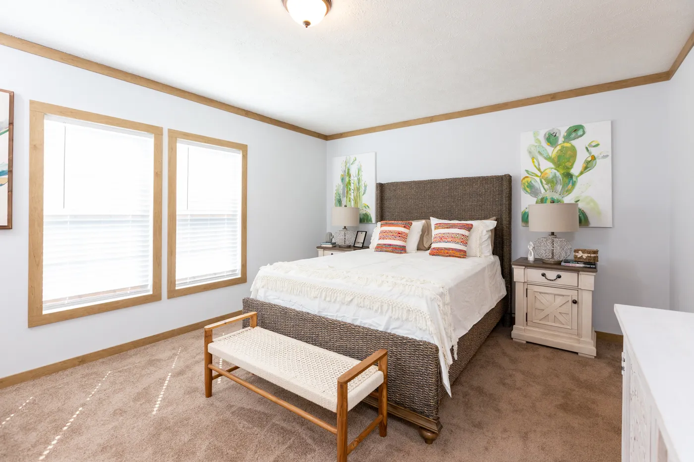 The THE KIMMEL Primary Bedroom. This Manufactured Mobile Home features 3 bedrooms and 2 baths.