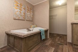 The THE EAGLE 60 Primary Bathroom. This Manufactured Mobile Home features 3 bedrooms and 2 baths.