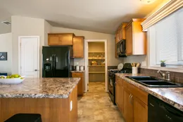 The THE WAVE Kitchen. This Manufactured Mobile Home features 4 bedrooms and 2 baths.