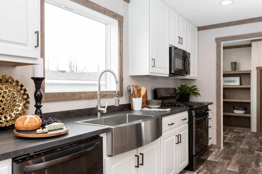 The AIMEE Kitchen. This Manufactured Mobile Home features 3 bedrooms and 2 baths.