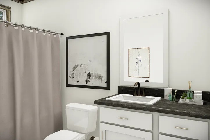 The THE SUMNER Guest Bathroom. This Manufactured Mobile Home features 3 bedrooms and 2 baths.