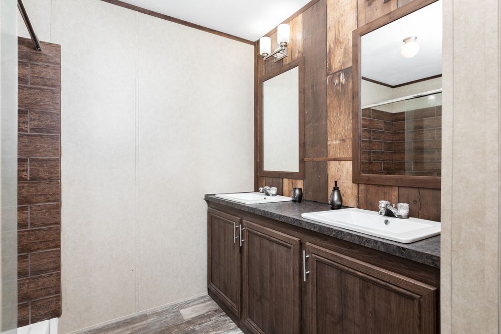 The THE RIVERWAY Primary Bathroom. This Manufactured Mobile Home features 4 bedrooms and 2 baths.