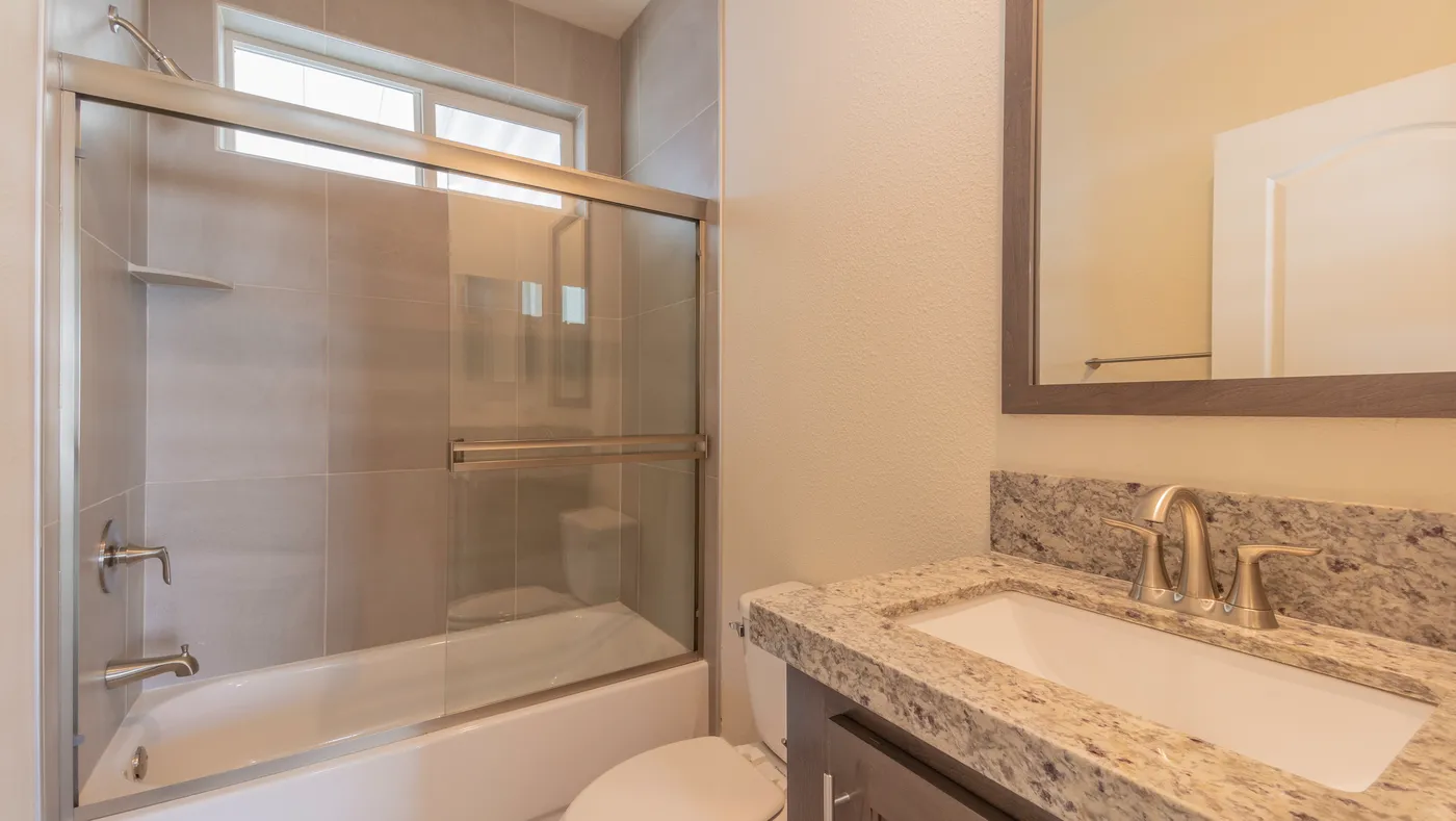 The CORONADO 2456B Guest Bathroom. This Manufactured Mobile Home features 3 bedrooms and 2 baths.