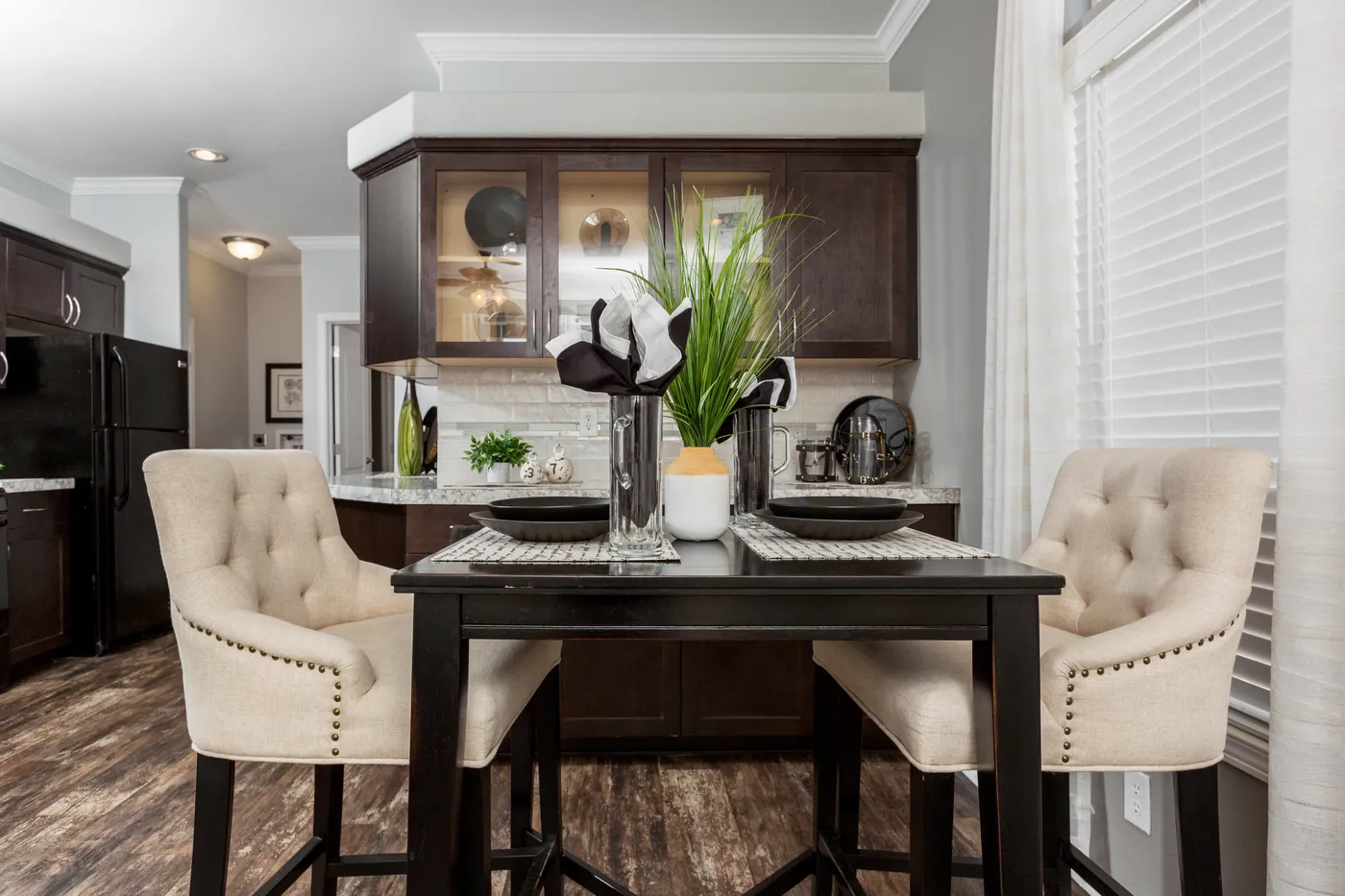 The K1640A Dining Room. This Manufactured Mobile Home features 1 bedroom and 1 bath.
