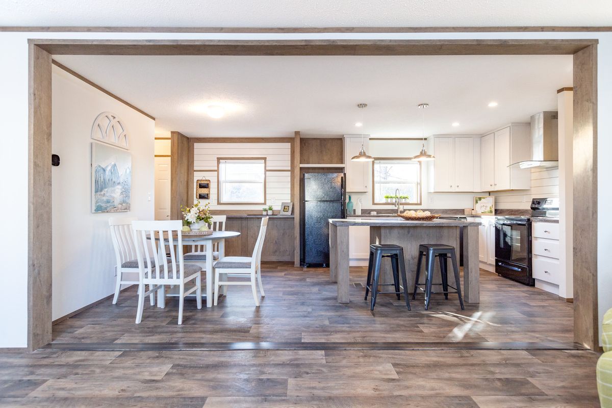 The LIFESTYLE 211 Kitchen. This Manufactured Mobile Home features 3 bedrooms and 2 baths.