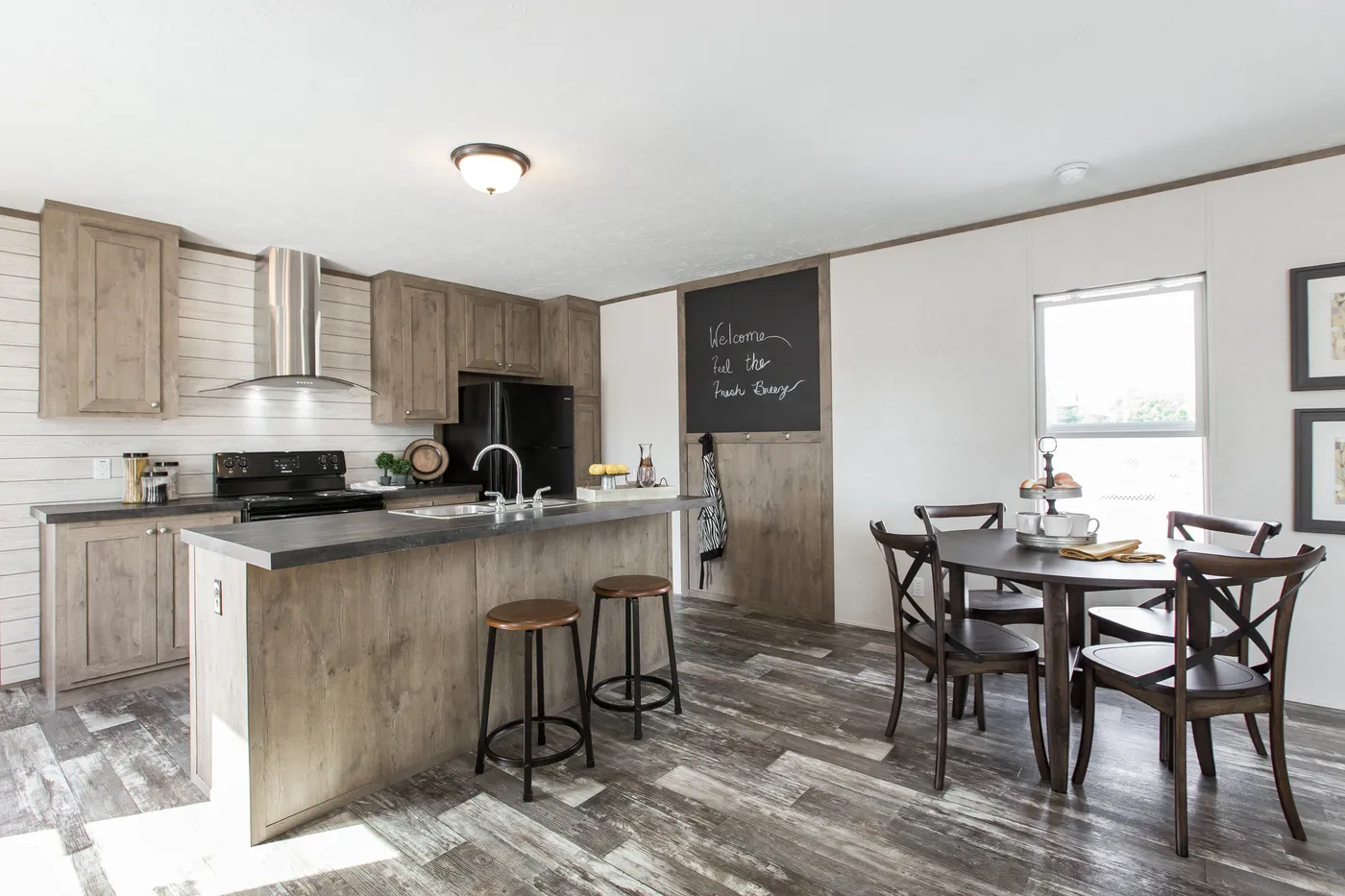 The THE BREEZE Kitchen. This Manufactured Mobile Home features 3 bedrooms and 2 baths.