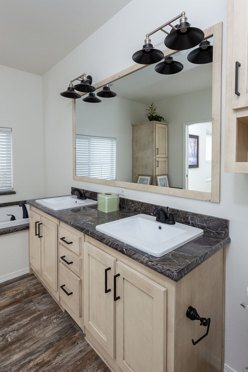 The 2848 MARLETTE SPECIAL Primary Bathroom. This Manufactured Mobile Home features 3 bedrooms and 2 baths.