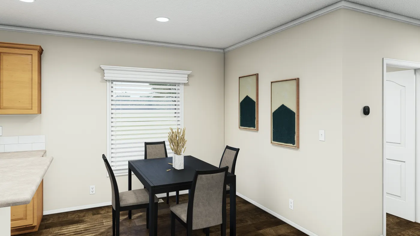 The K2760B Dining Area. This Manufactured Mobile Home features 4 bedrooms and 2 baths.