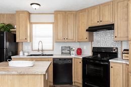 The BLAZER 76 P Kitchen. This Manufactured Mobile Home features 3 bedrooms and 2 baths.