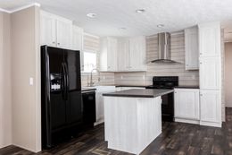 The ANNIVERSARY PLUS 72 Kitchen. This Manufactured Mobile Home features 3 bedrooms and 2 baths.