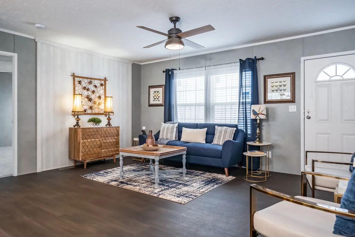 The ULTRA BREEZE 52 Living Room. This Manufactured Mobile Home features 3 bedrooms and 2 baths.