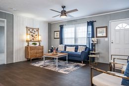 The ULTRA BREEZE 52 Living Room. This Manufactured Mobile Home features 3 bedrooms and 2 baths.