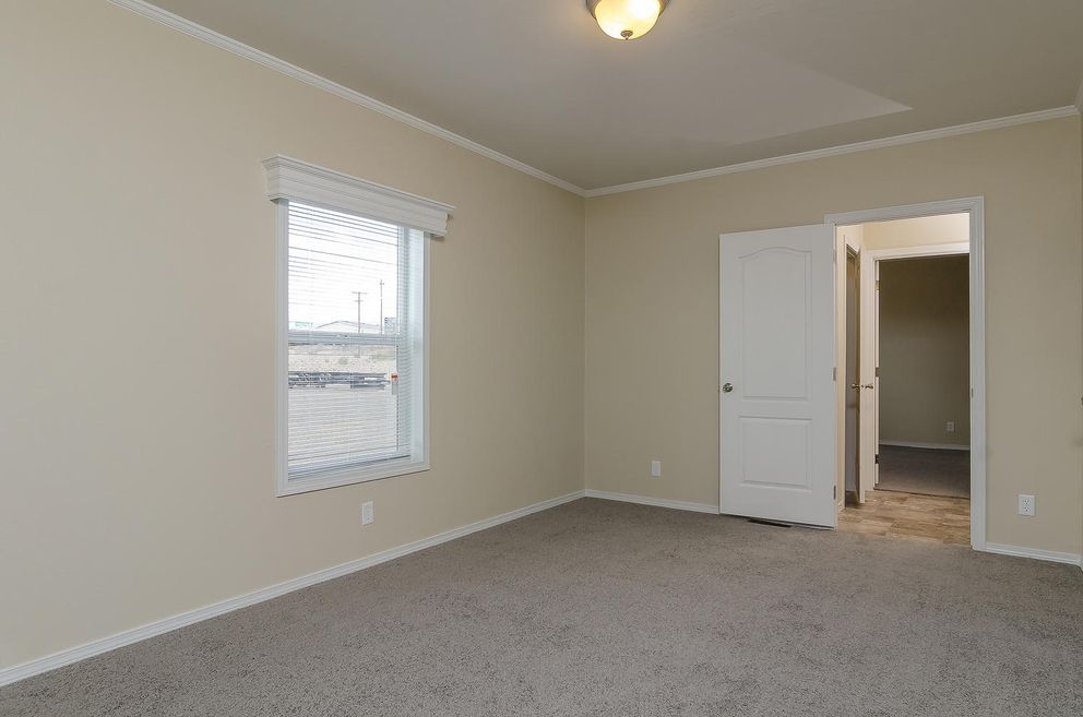The K3076A Bedroom. This Manufactured Mobile Home features 4 bedrooms and 2 baths.