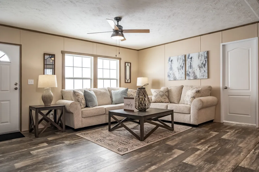 The ULTRA PRO 56B Living Room. This Manufactured Mobile Home features 3 bedrooms and 2 baths.